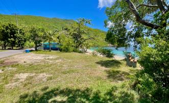 Lower Bay 1 Acre Prime Beachfront Land