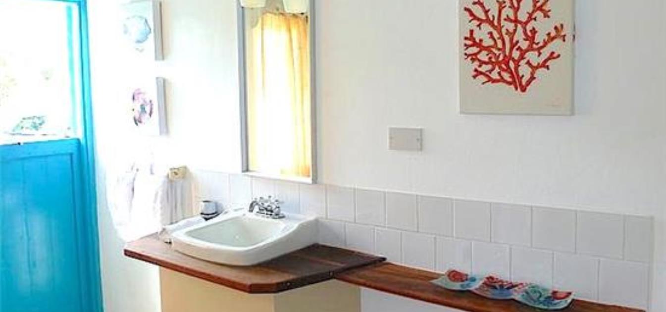 vacation-rentals/st-vincent-and-the-grenadines/bequia/friendship-bay/sugarapple-beach-cottage-1