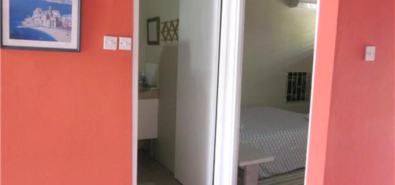 vacation-rentals/st-vincent-and-the-grenadines/st-vincent/arnos-vale/buttercup-cottage-hibiscus-apt