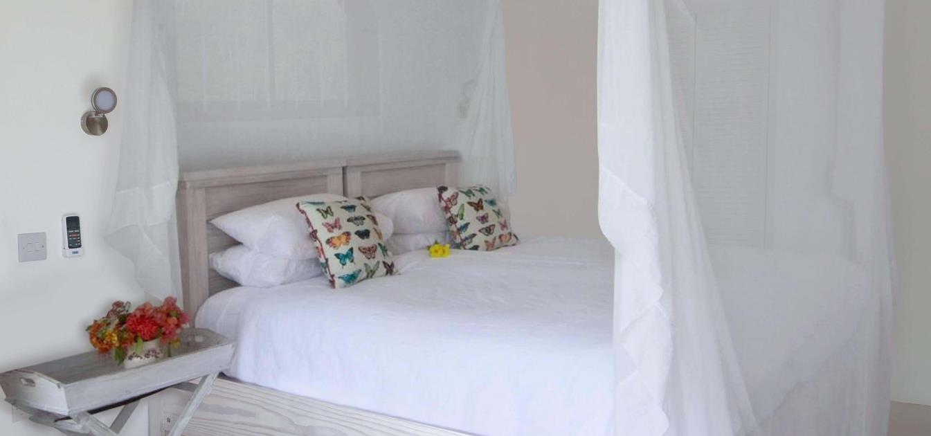 vacation-rentals/st-vincent-and-the-grenadines/bequia/lower-bay/the-lookout-hummingbird-deck