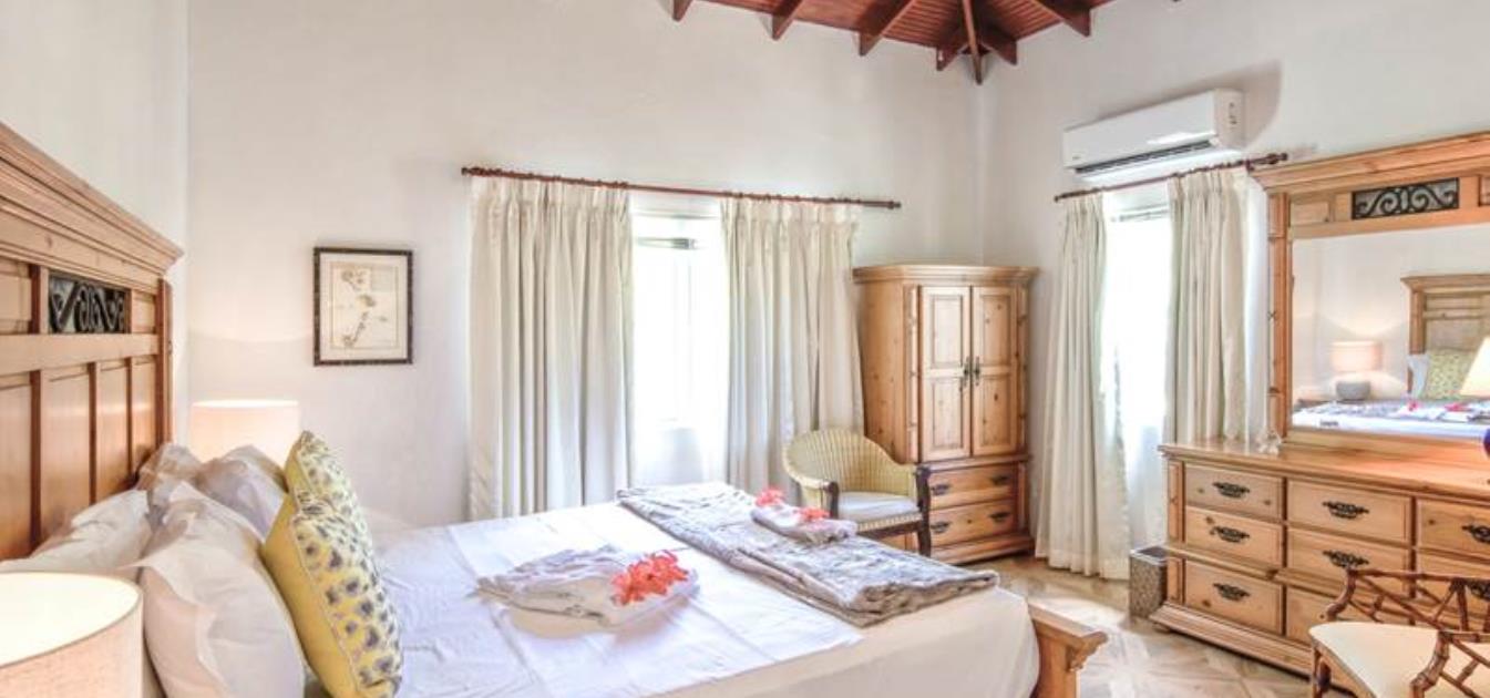 vacation-rentals/st-vincent-and-the-grenadines/bequia/friendship-bay/bequia-beach-hotel-palm-villa
