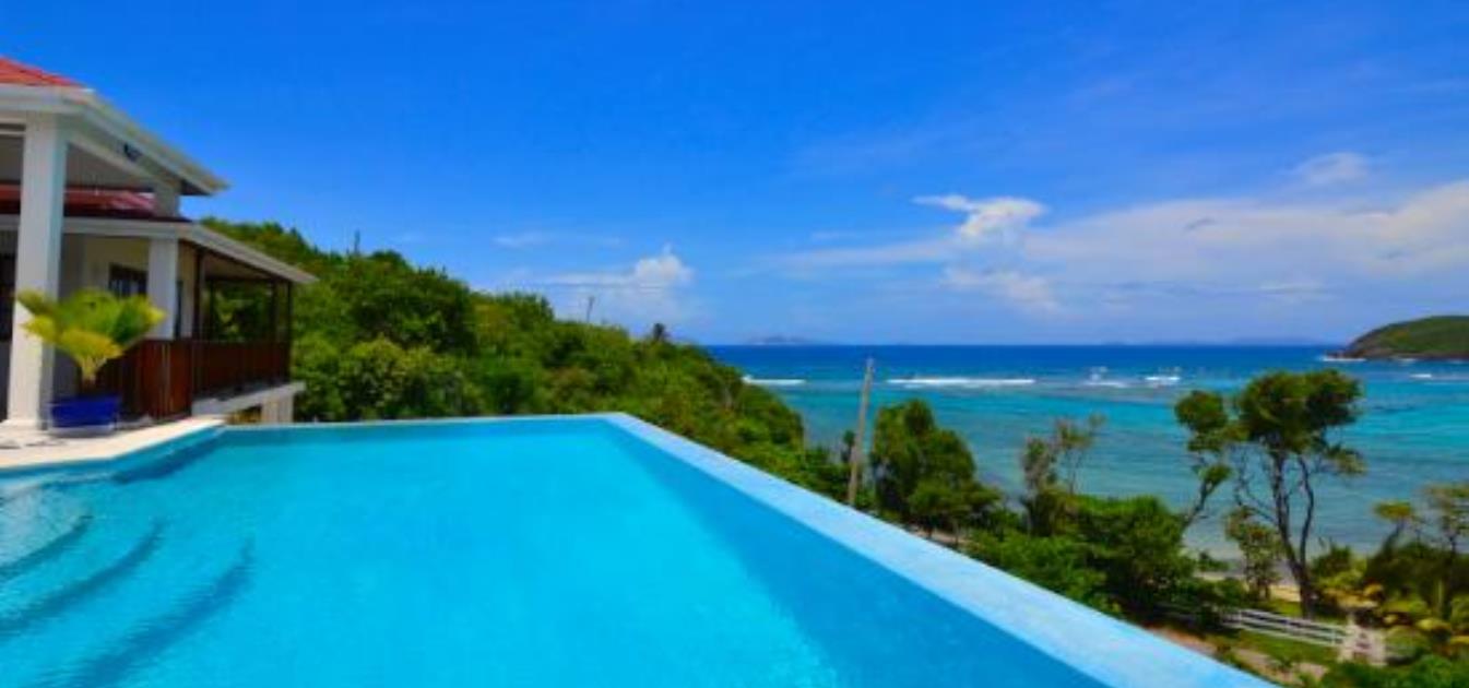 vacation-rentals/st-vincent-and-the-grenadines/bequia/crescent-bay/beachfront-plantation-house-ijeoma-divine-main-house