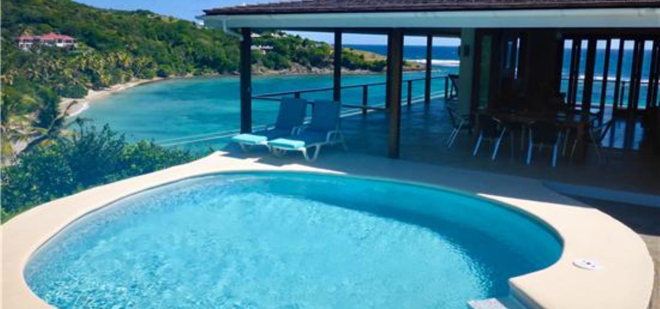vacation-rentals/st-vincent-and-the-grenadines/bequia/crescent-bay/jamdown-upper-ocean-deck