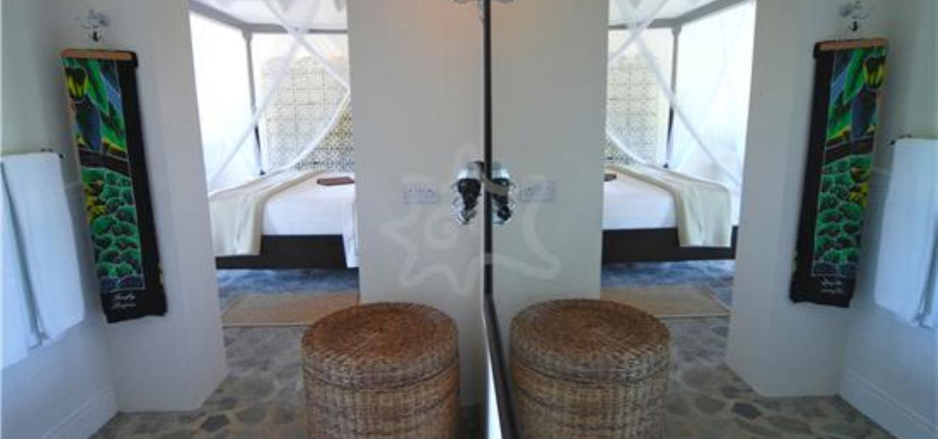 vacation-rentals/st-vincent-and-the-grenadines/bequia/spring/firefly-bequia-plantation-cottage