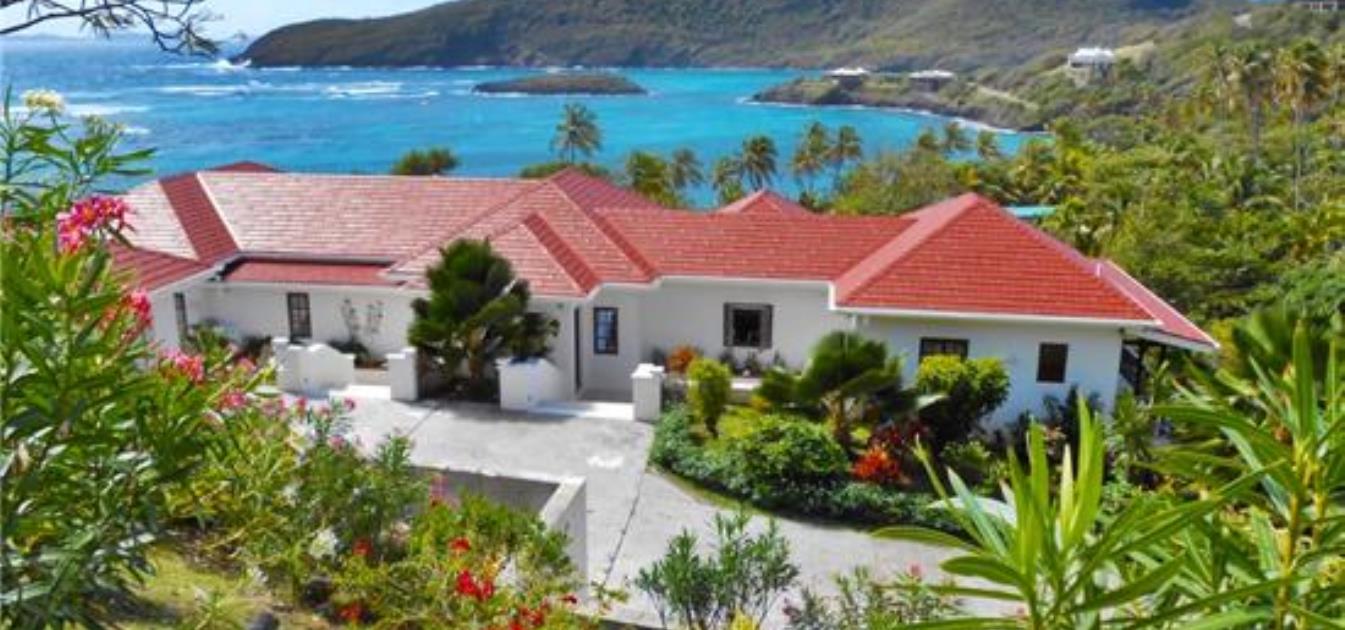 vacation-rentals/st-vincent-and-the-grenadines/bequia/crescent-bay/beachfront-plantation-house-ijeoma-shoreside