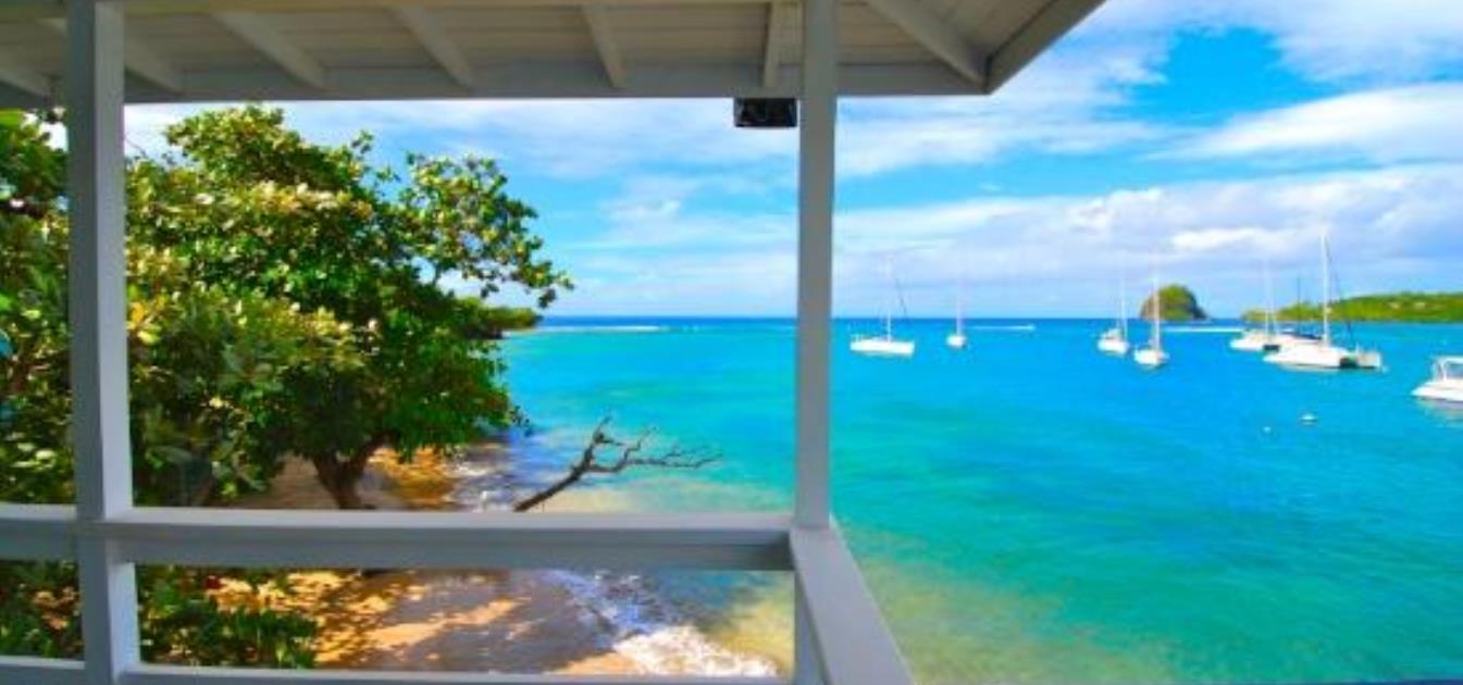 vacation-rentals/st-vincent-and-the-grenadines/st-vincent/ratho-mill/white-sands-luxury-dock-cottage
